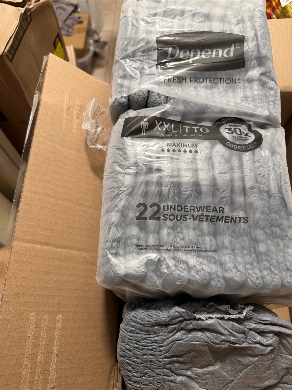 Depend Men’s Gray Incontinence Underwear - XXL, 22 Count open bag
